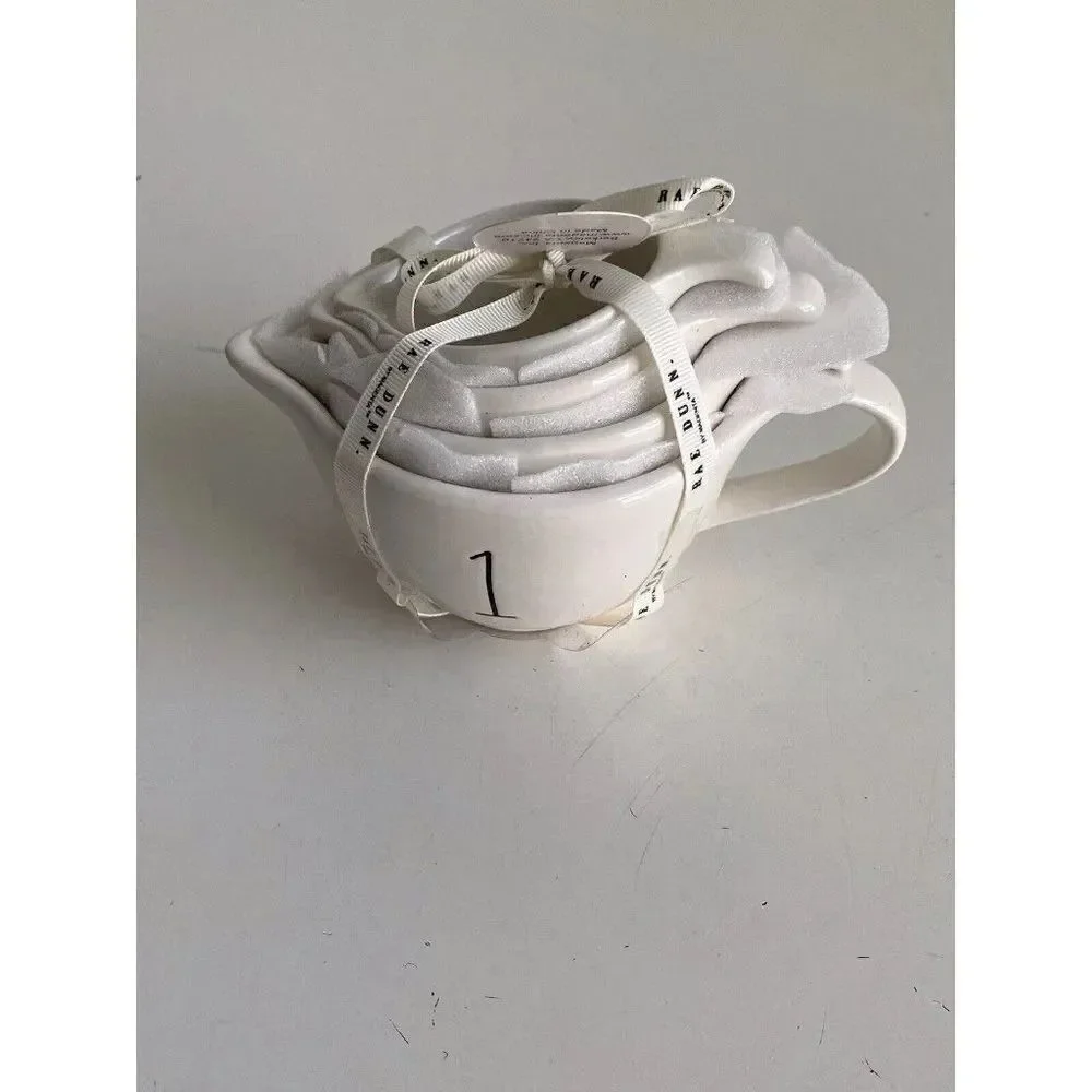 Rae Dunn White Tea Cup Measuring Cups With Cute Handle 4 Piece Set New with Tags